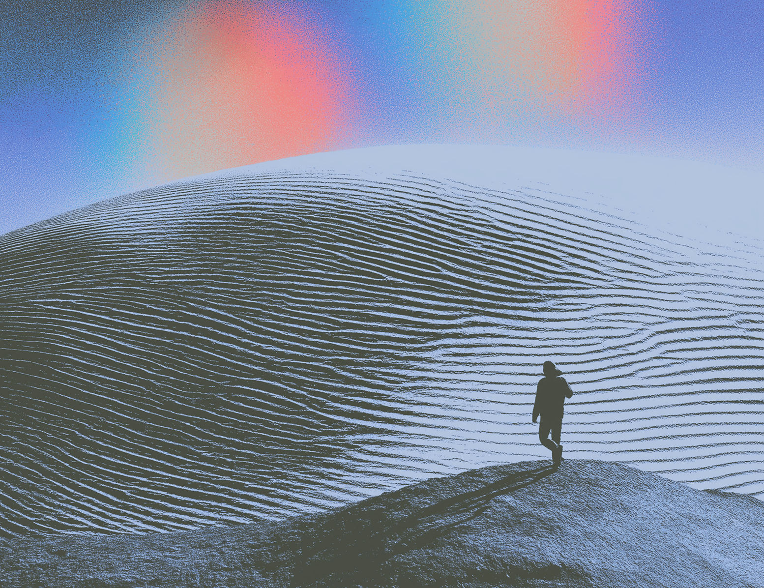 Moody landscape with a lone figure on a ridge